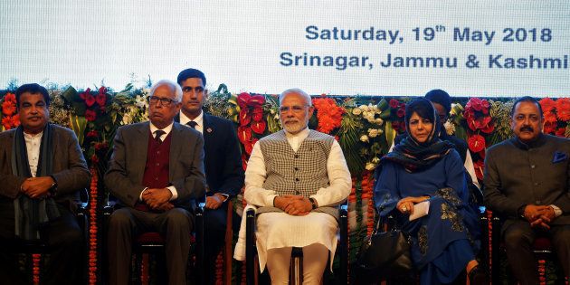 India's Prime Minister Narendra Modi (C), Jammu and Kashmir Chief Minister Mehbooba Mufti (2nd R) attend the inauguration of a hydroelectric power plant in the state of Jammu and Kashmir, at Sher-i-Kashmir International Conference Centre (SKICC) in Srinagar, May 19, 2018. REUTERS/Danish Ismail