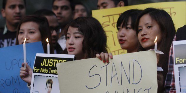 Students from North Eastern India during a candle light vigil against racism and the beating and killing of student Nido Taniam at Jantar Mantar, on February 2, 2014 in New Delhi.
