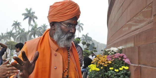 NEW DELHI, INDIA - DECEMBER 7: BJP MP Sakshi Maharaj during the winter session at Parliament on December 7, 2015 in New Delhi, India. The third week of the winter session of Parliament is likely to see the NDA government push for passage of key legislation including the GST Bill. (Photo by Mohd Zakir/Hindustan Times via Getty Images)