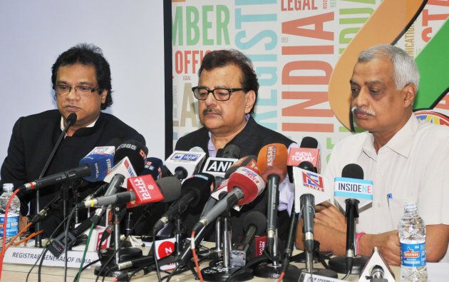 Registrar General of India Sailesh (C) and NRC state coordinator Prateek Hajela (L) addresses a press conference on the final draft of Assam's National Register of Citizens, at NRC office, Bhangagarh on July 30, 2018 in Guwahati, India.