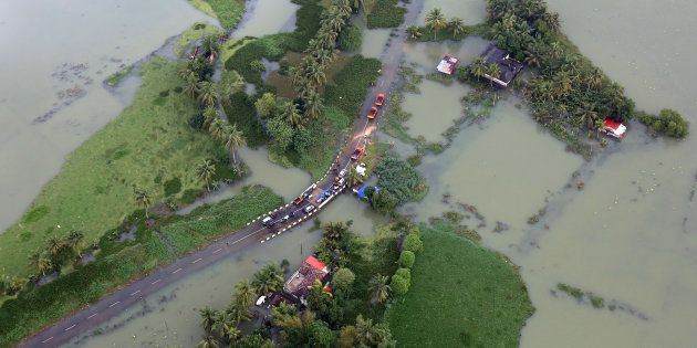 An aerial view shows partially submerged road at a flooded area in the southern state of Kerala, India, August 19, 2018. REUTERS/Sivaram V