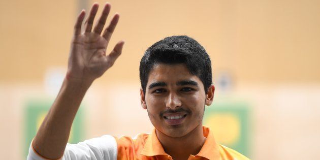 India's Saurabh Chaudhary celebrates after winning the men's 10m air pistol shooting final during the 2018 Asian Games in Palembang on August 21, 2018. (Photo by Mohd RASFAN / AFP) (Photo credit should read MOHD RASFAN/AFP/Getty Images)