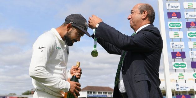 Captain Virat Kohli receives his man of the match award from Richard Tennant, chairman of Nottinghamshire CCC after day 5 of the 3rd Test Match between England and India at Trent Bridge on Wednesday.