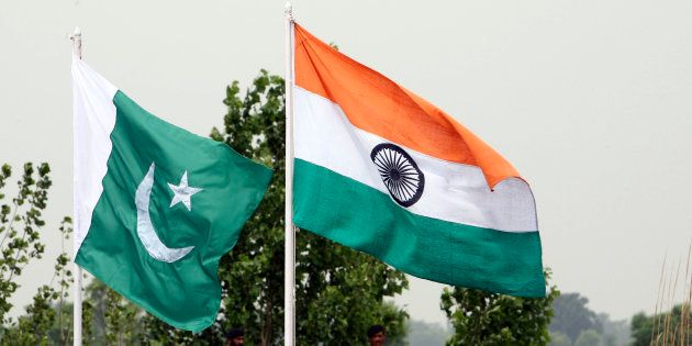 A file photo of the Indian and Pakistani national flags near the border.