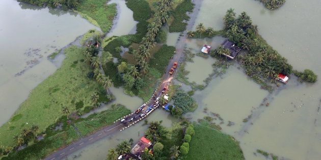 A partially submerged road at a flooded area in Kerala on 19 August.