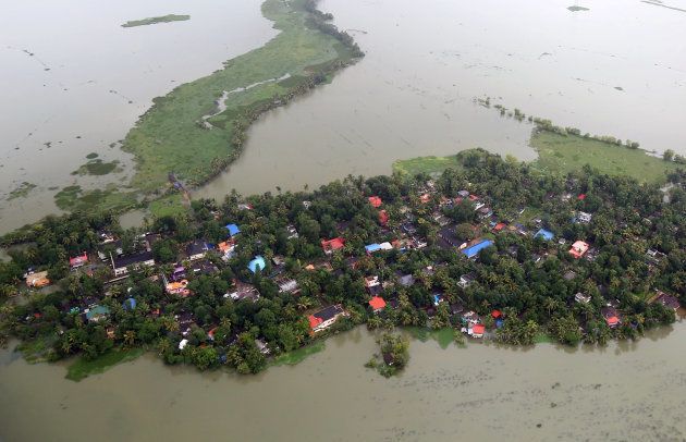 An aerial view of partially submerged houses at a flooded area in Kerala on 19 August.