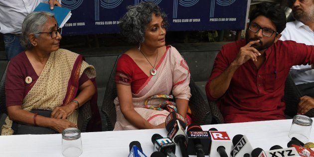 (From left) Aruna Roy, Arundhati Roy and Jignesh Mevani at the press conference in New Delhi on Thursday.
