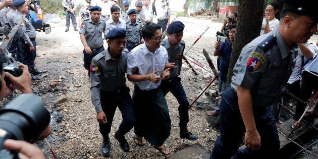Detained Reuters journalists Wa Lone and Kyaw Soe Oo arrive to listen to their verdict at Insein court in Yangon, Myanmar on Monday.