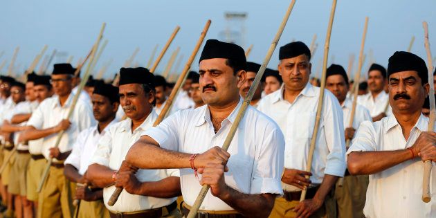 Volunteers of the India's Hindu nationalist organisation Rashtriya Swayamsevak Sangh (RSS) take part in a drill during their workers' meet in the western Indian city of Ahmedabad January 3, 2015. REUTERS/Amit Dave (INDIA - Tags: POLITICS)