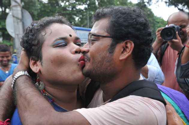 A couple share a kiss in Kolkata after the Supreme Court verdict.