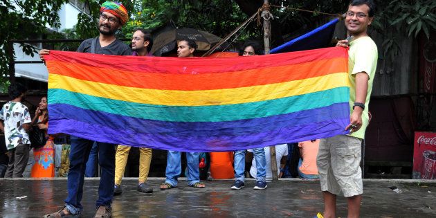 Members of LGBT community celebrate at the Supreme Court of India after the decision to strike down the colonial-era ban on gay sex.
