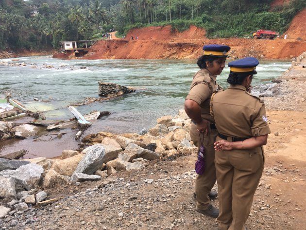 Chunks of buildings lie in the Periyar river, swept away by the force of floodwaters when all five shutters of the Cheruthoni dam were opened.