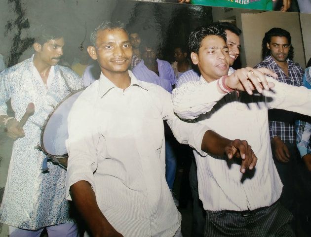 Joginder (left) at his brother's wedding.