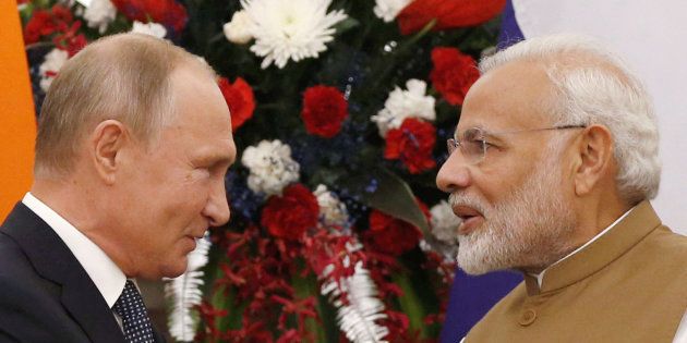 Russian President Vladimir Putin and India's Prime Minister Narendra Modi are seen after delivering a joint statement after their delegation level talks at Hyderabad House in New Delhi, India, 5 October, 2018.