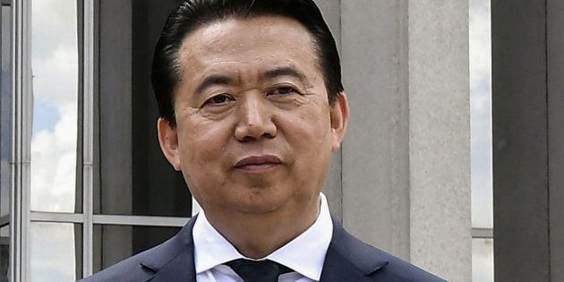 INTERPOL President Meng Hongwei poses during a visit to the headquarters of International Police Organisation in Lyon, France, May 8, 2018.