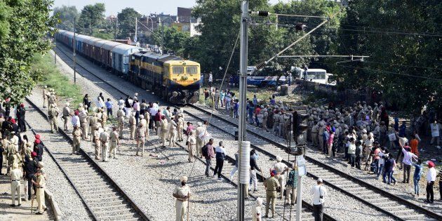 Amid high security the railway tracks were cleared by dispersing agitating people, near the site of train accident at Jaura Phatak on October 21, 2018.