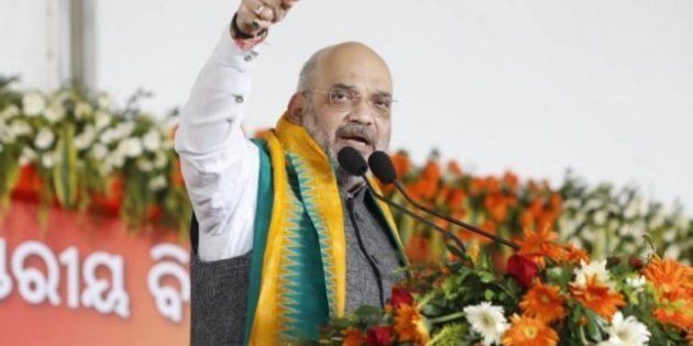 Amit Shah gesturing at the Kannur rally on Saturday, October 27.