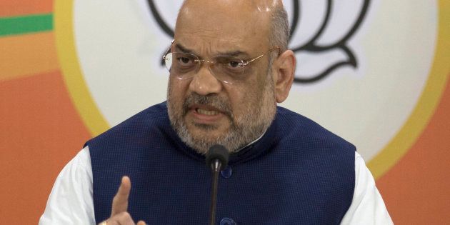 India's ruling Bharatiya Janata Party (BJP) President Amit Shah speaks at a press conference in Hyderabad, India, Saturday, Sept. 15, 2018. Elections to choose state lawmakers will be held later in the year in Telangana. (AP Photo/Mahesh Kumar A.)