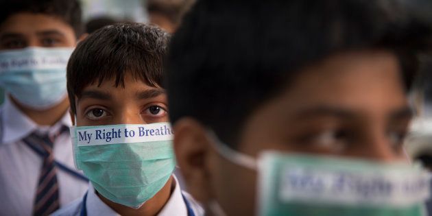 School children take out march to express their distress on the alarming levels of pollution in the city, in New Delhi, India in 2017.