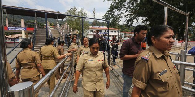Police women above the age of 50, who have been deployed for security, return after worshipping at the Sabarimala temple.