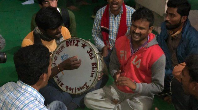 Farmers from Andhra Pradesh singing folk songs with students of Jawaharlal Nehru University (JNU) on Wednesday.