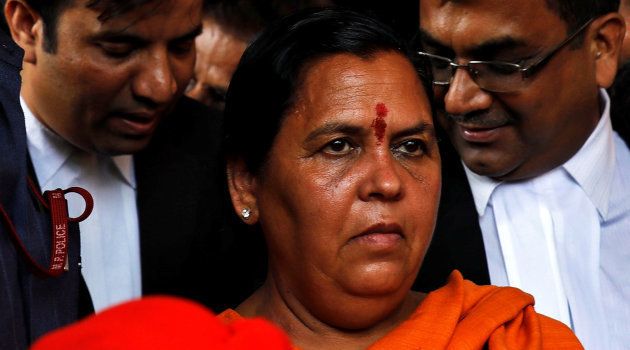 India's Water Resources minister Uma Bharti, one of the accused who is charged over the 1992 Babri mosque demolition case, leaves after appearing in a court in Lucknow, India, May 30, 2017. REUTERS/Pawan Kumar