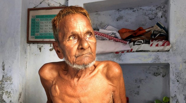 Mohammad Hashim Ansari, the oldest litigant in a case seeking to preserve Muslim claim on a disputed religious site, sits inside his house at a Muslim neighbourhood in Ayodhya in the northern state of Uttar Pradesh, India, June 16, 2016. Picture taken June 16, 2016. To match Insight INDIA-MODI/TEMPLE REUTERS/Tom Lasseter