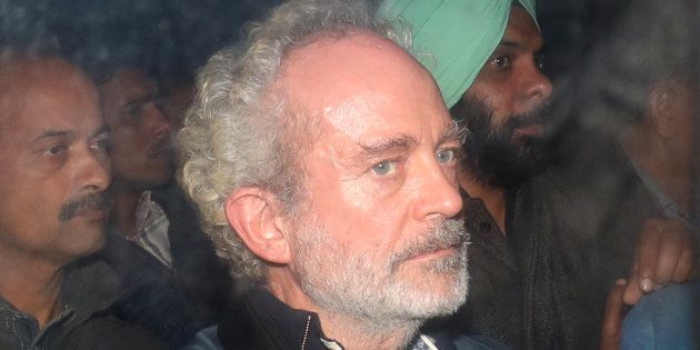 Christian Michel, a key accused and alleged middleman in India's abortive, scandal-tainted helicopter deal with Anglo-Italian firm Agusta Westland, is pictured inside a police vehicle outside a court in New Delhi.