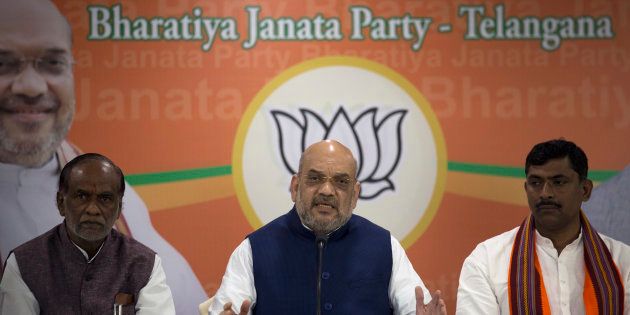 BJP President Amit Shah, center, with Telangana state party president K. Laxman, left, and National General-Secretary Muralidhar Rao in a file photo
