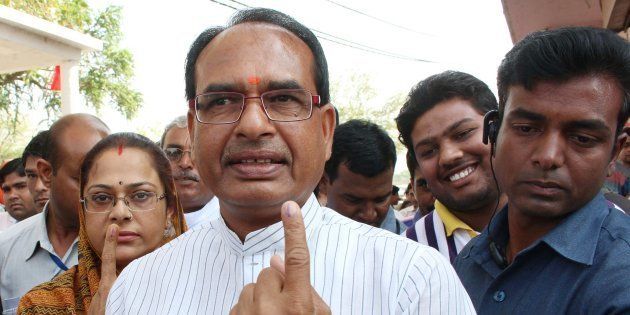 Chief Minister of Madhya Pradesh Shivraj Singh Chouhan after casting his vote on 28 November .