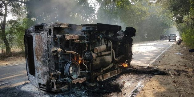 A burnt vehicle after mob violence at Chingravati village in Bulandhahr on Monday.
