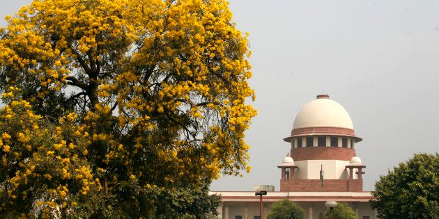 A view of Indian Supreme court main building from the supreme court lawn inside of the Indian Apex Court campus.