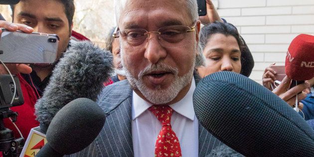Vijay Mallya arrives for the ruling in his extradition hearing at Westminster Magistrates' Court in London on 10 December.