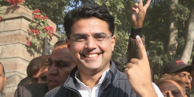 State Congress President and candidate from Tonk, Sachin Pilot, shows his inked finger after casting his vote at a polling booth, at Jalupura on December 7, 2018 in Jaipur.