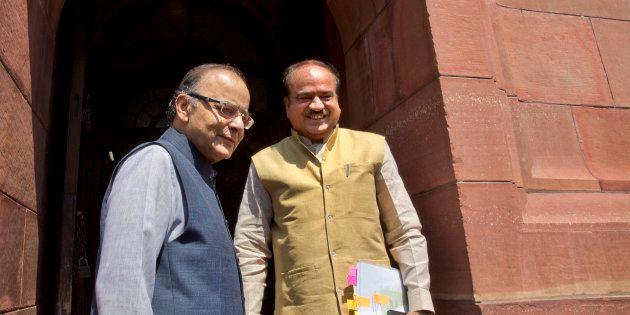 Indian Finance Minister Arun Jaitley, left, with Indian Minister for Chemicals and Fertilizers, Ananth Kumar, arrive at the parliament house in New Delhi, India, Aug. 3, 2017.