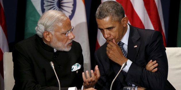 File photo of US President Barack Obama (R) with Indian Prime Minister Narendra Modi.
