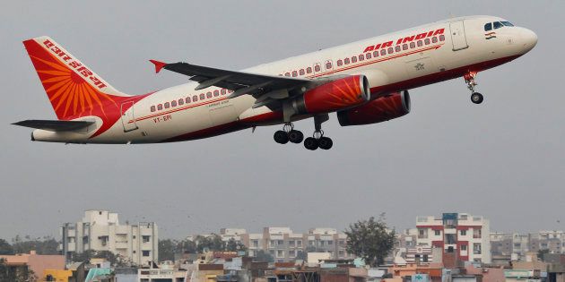 An Air India passenger plane takes off from Sardar Vallabhbhai Patel International Airport in the western Indian city of Ahmedabad January 30, 2013. REUTERS/Amit Dave (INDIA - Tags: TRANSPORT)