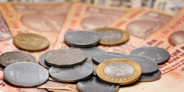 Indian Currency different Rupee bank notes and coins background