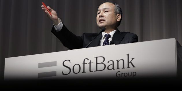 Billionaire Masayoshi Son, chairman and chief executive officer of SoftBank Group Corp., gestures as he speaks during a news conference in Tokyo, Japan, on Monday, Nov. 7, 2016.