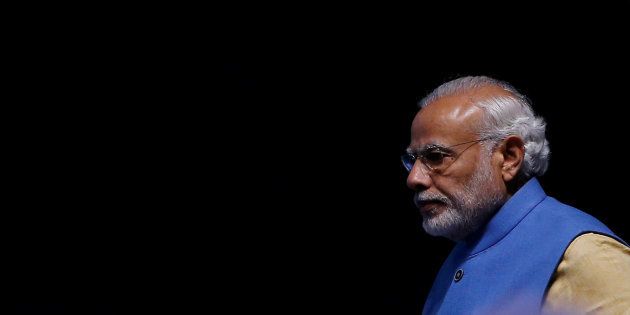 India's Prime Minister Narendra Modi arrives to launch a digital payment app linked with a nationwide biometric database during the