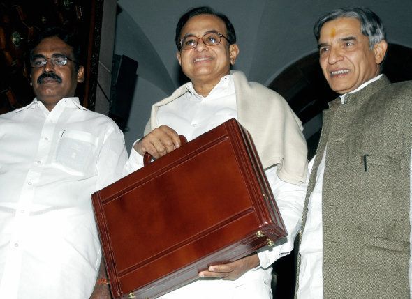 Indian Finance Minister P. Chidambaram (C) and Ministers of state for Finance Pawan Kumar Bensal (R) and Palanin Manikkam (L) arrive at the National Parliament to present the government's federal budget for the fiscal year starting 01 April, in New Delhi, 28 February 2007.