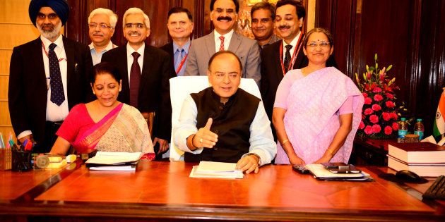 NEW DELHI, INDIA JULY 9: Arun Jaitley, Minister of Finance, and Nirmala Sitharaman, Minister of State for Finance, with full budget team giving final touches to the Union Budget 2014 on July 9, 2014 in New Delhi, India. (Photo by Pradeep Gaur/Mint via Getty Images)