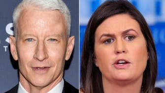 Anderson Cooper and Sarah Huckabee Sanders