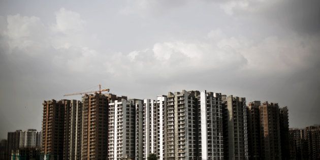 A view shows a residential complex that is under construction in Noida on the outskirts of New Delhi, India, August 20, 2015.