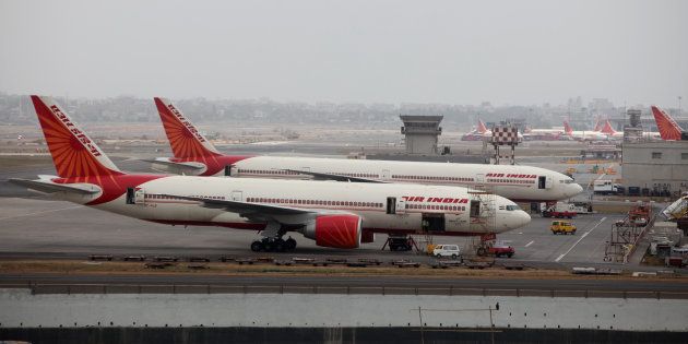 Air India aircrafts are seen parked on the tarmac of the international airport in Mumbai.