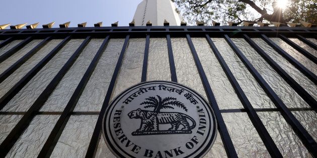 FILE PHOTO: The Reserve Bank of India (RBI) seal is pictured on a gate outside the RBI headquarters in Mumbai.
