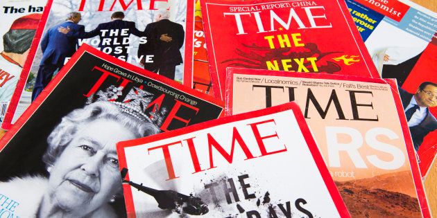 Popular Magazines in English language displayed, including Time and The Economist.