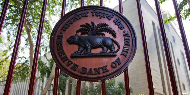 The Reserve Bank of India (RBI) logo is displayed on a gate at the central bank's headquarters in New Delhi.