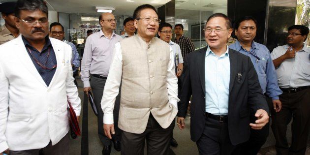 NEW DELHI, INDIA - MARCH 27: Arunachal Pradesh Chief Minister Nabam Tuki (R) shares a light moment with his Nagaland counterpart TR Zeliang after the first meeting of the sub-group of Chief Ministers at NITI Aayog on March 27, 2015 in New Delhi, India. NITI Aayog will set up a working group to prepare a draft report on how to make implementation of Centrally Sponsored Schemes (CSS) more effective. (Photo by Arun Sharma/Hindustan Times via Getty Images)