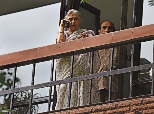 NEW DELHI, INDIA - JULY 14: Former Delhi Chief Minister Sheila Dikshit talking on phone at her residence in Nazzamuddin east on July 14, 2016 in New Delhi, India. Sheila Dikshit is set to become Congress face for crucial Uttar Pradesh polls. (Photo by Sonu Mehta/Hindustan Times via Getty Images)